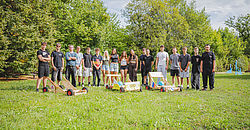 Group photo of apprentices with soapbox cars